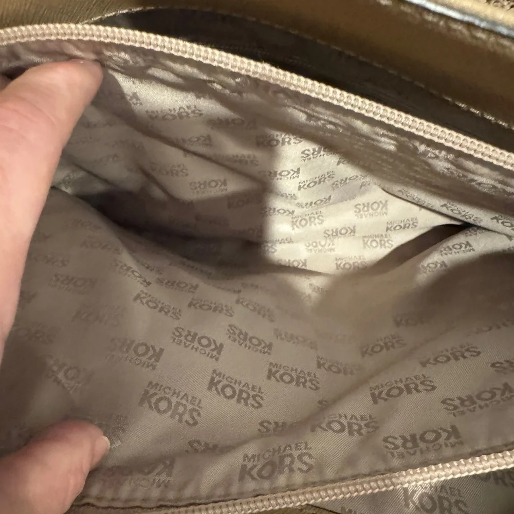 Michael Kors questions leave